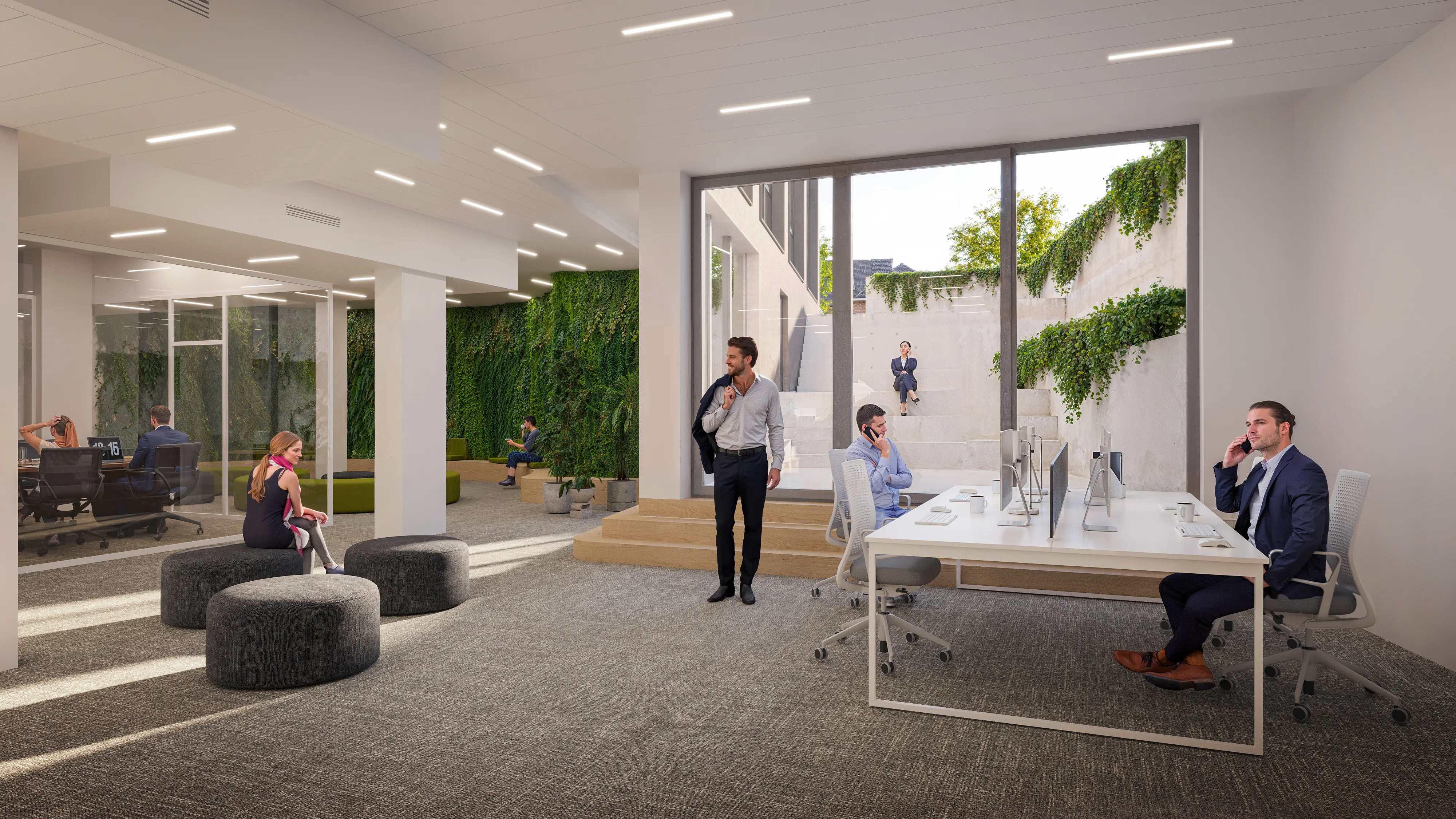 Rise and Heights — open-plan office opening onto a green wall